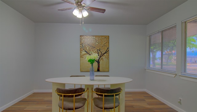 3404 Alhambra Dr, Forest Hill, TX 76119 - dining space with wood finished floors, a ceiling fan, and baseboards