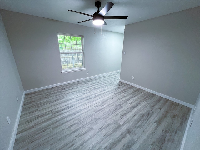 2946 Ridgewood Dr, Grapevine, TX 76051 - empty room featuring wood finished floors, ceiling fan, and baseboards