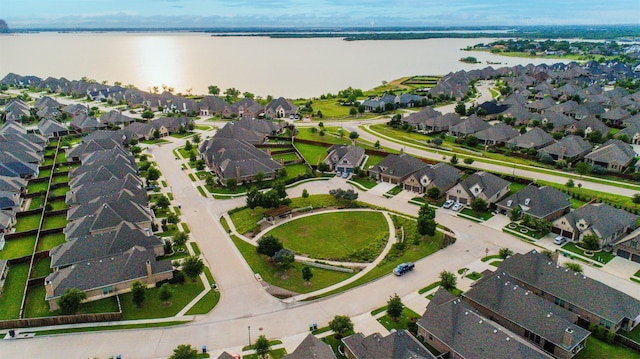 7721 Haddington, The Colony, TX 75056 - aerial view of property and surrounding area with nearby suburban area and a nearby body of water