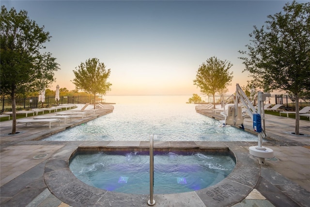 7721 Haddington, The Colony, TX 75056 - view of swimming pool with a community hot tub and a water view