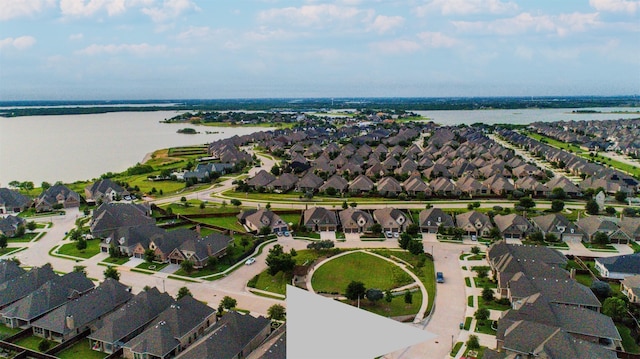 7721 Haddington, The Colony, TX 75056 - aerial overview of property's location with nearby suburban area and a large body of water