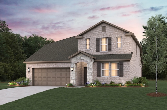 5309 Overbrook Dr, Denton, TX 76207 - view of front of house featuring driveway, an attached garage, stone siding, a lawn, and a shingled roof