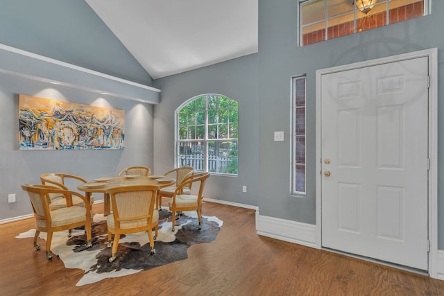 4001 Elmhill Dr, Plano, TX 75024 - dining space with wood finished floors, baseboards, and high vaulted ceiling