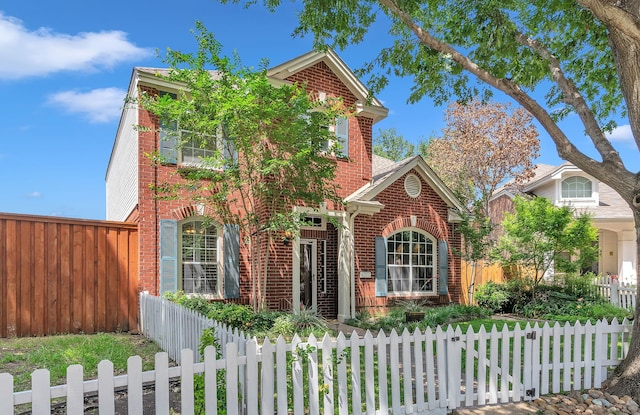 4001 Elmhill Dr, Plano, TX 75024 - traditional home with brick siding and a fenced front yard