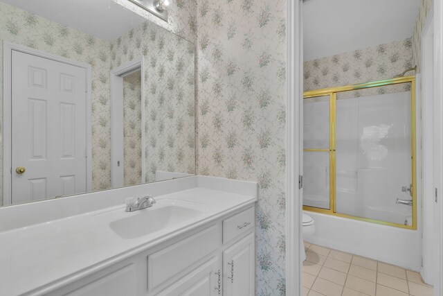 4001 Elmhill Dr, Plano, TX 75024 - bathroom with tile patterned floors, vanity, toilet, enclosed tub / shower combo, and wallpapered walls