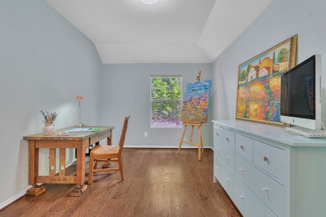 4001 Elmhill Dr, Plano, TX 75024 - office area with wood finished floors, vaulted ceiling, and baseboards