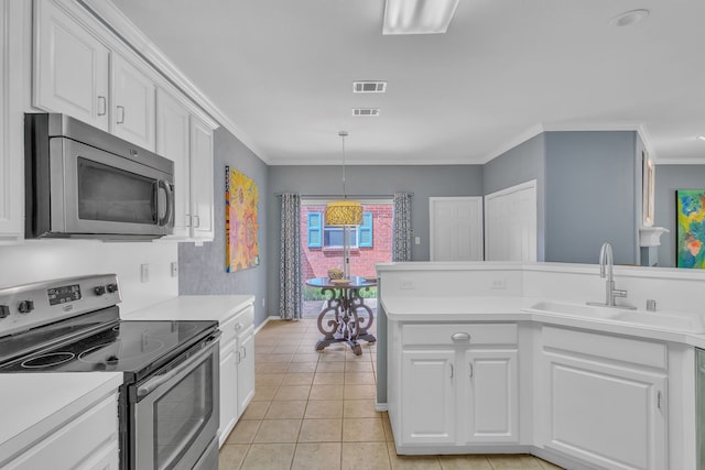 4001 Elmhill Dr, Plano, TX 75024 - kitchen featuring appliances with stainless steel finishes, a sink, white cabinets, light countertops, and crown molding