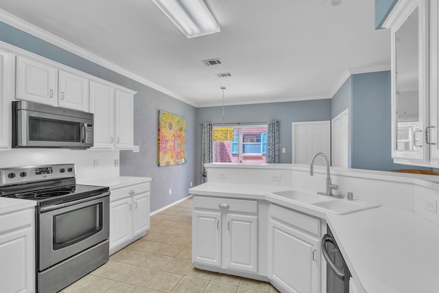 4001 Elmhill Dr, Plano, TX 75024 - kitchen featuring appliances with stainless steel finishes, light countertops, a sink, light tile patterned floors, and ornamental molding