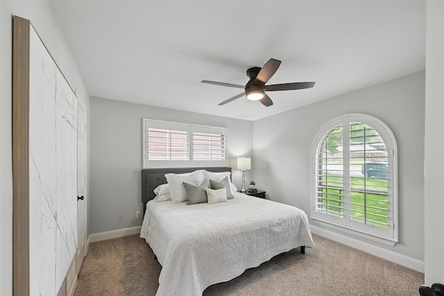 16905 Colegrove Dr, Dallas, TX 75248 - bedroom with carpet, baseboards, and ceiling fan