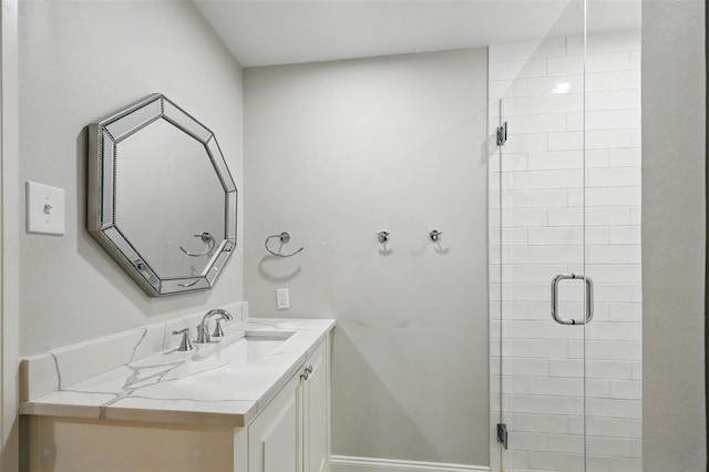 16905 Colegrove Dr, Dallas, TX 75248 - bathroom with vanity, a shower stall, and baseboards