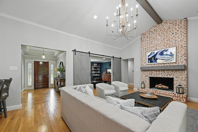 16905 Colegrove Dr, Dallas, TX 75248 - living area featuring a barn door, crown molding, light wood-style floors, baseboards, and a chandelier
