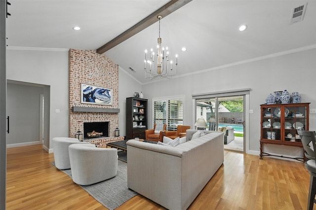 16905 Colegrove Dr, Dallas, TX 75248 - living room with light wood-type flooring, baseboards, a chandelier, a brick fireplace, and recessed lighting