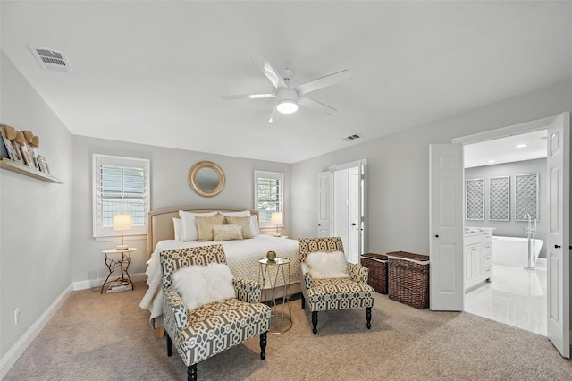 16905 Colegrove Dr, Dallas, TX 75248 - bedroom featuring light colored carpet, baseboards, connected bathroom, and ceiling fan