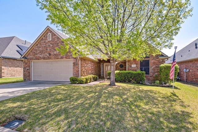 623 Madison Pl, Sherman, TX 75092 - view of front facade featuring a garage, concrete driveway, a front yard, and brick siding