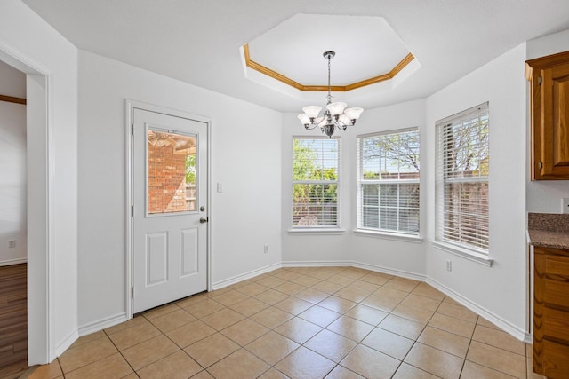 623 Madison Pl, Sherman, TX 75092 - unfurnished dining area featuring a raised ceiling, plenty of natural light, a chandelier, and light tile patterned floors