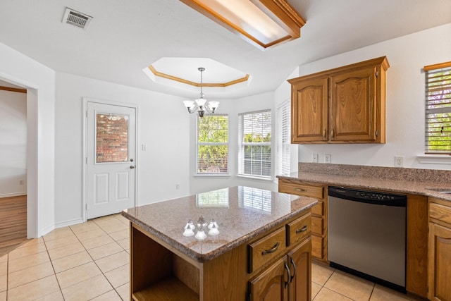 623 Madison Pl, Sherman, TX 75092 - kitchen with stainless steel dishwasher, light tile patterned floors, brown cabinets, a chandelier, and open shelves
