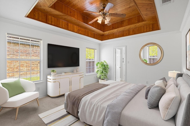 623 Madison Pl, Sherman, TX 75092 - carpeted bedroom with a tray ceiling, wooden ceiling, multiple windows, baseboards, and a ceiling fan