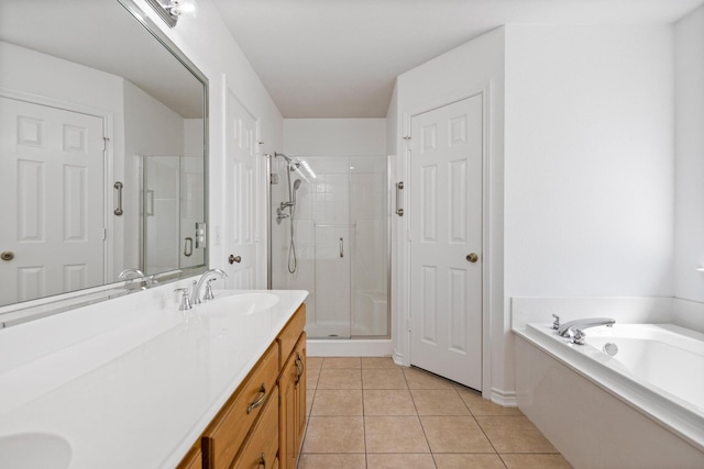 623 Madison Pl, Sherman, TX 75092 - bathroom with double vanity, a stall shower, tile patterned flooring, and a bath