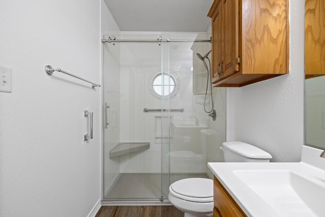 623 Madison Pl, Sherman, TX 75092 - full bath with toilet, vanity, a stall shower, and wood finished floors