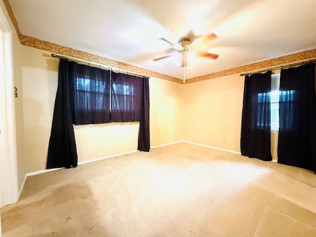 1210 Carroll Dr, Garland, TX 75041 - empty room with baseboards, carpet, and ceiling fan