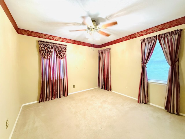 1210 Carroll Dr, Garland, TX 75041 - unfurnished room featuring ceiling fan, carpet floors, and baseboards
