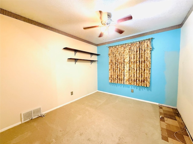 1210 Carroll Dr, Garland, TX 75041 - spare room featuring a ceiling fan, carpet, baseboards, and crown molding