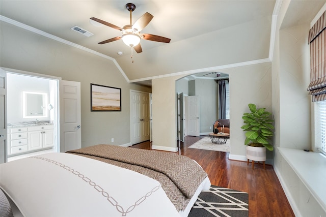 209 Pine Valley Ct, Fairview, TX 75069 - bedroom with ornamental molding, wood finished floors, vaulted ceiling, a sink, and arched walkways