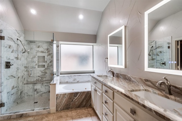 209 Pine Valley Ct, Fairview, TX 75069 - bathroom featuring a tub with jets, vaulted ceiling, a marble finish shower, double vanity, and tile patterned floors