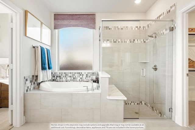 4622 Bel Air Dr, Midlothian, TX 76065 - bathroom with a stall shower, a bath, tile patterned floors, and a walk in closet