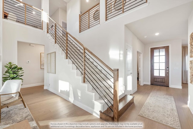 4622 Bel Air Dr, Midlothian, TX 76065 - entrance foyer featuring wood finished floors, stairs, a towering ceiling, baseboards, and recessed lighting