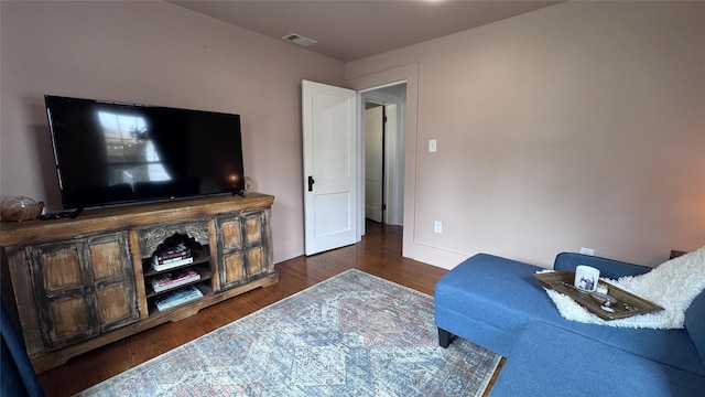 573 S Preston Ave, Van Alstyne, TX 75495 - living room featuring wood finished floors and baseboards