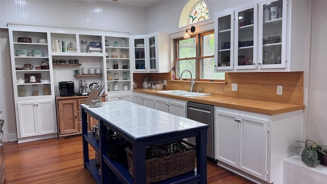 573 S Preston Ave, Van Alstyne, TX 75495 - kitchen with a sink, open shelves, dishwasher, and white cabinets