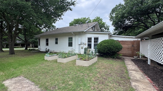 573 S Preston Ave, Van Alstyne, TX 75495 - back of property with a garden