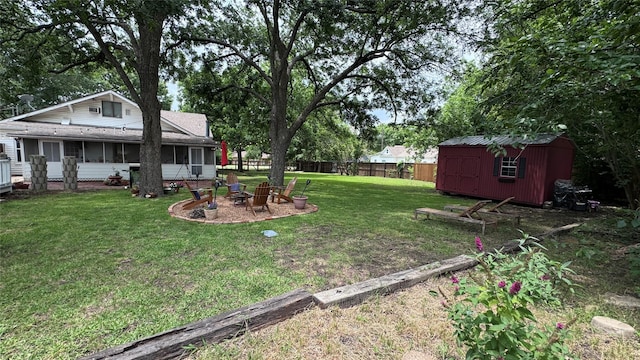 573 S Preston Ave, Van Alstyne, TX 75495 - view of yard with a sunroom and a fire pit