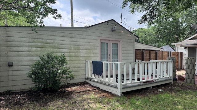 573 S Preston Ave, Van Alstyne, TX 75495 - view of home's exterior featuring a wooden deck and french doors