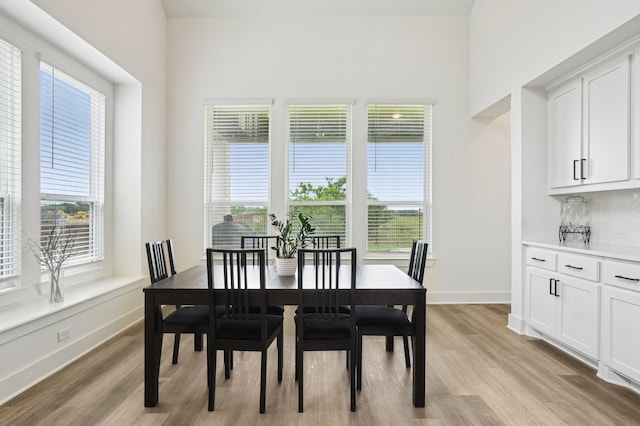 422 Firecrest Ln, Celina, TX 75009 - dining space featuring light wood-style flooring and baseboards
