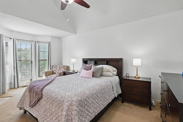 211 Cimarron Trl Unit 8, Irving, TX 75063 - bedroom featuring light colored carpet, vaulted ceiling, ceiling fan, and baseboards