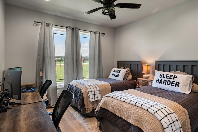 100 Tall Grass Ct, Weatherford, TX 76087 - bedroom featuring light wood-type flooring, an office area, and ceiling fan