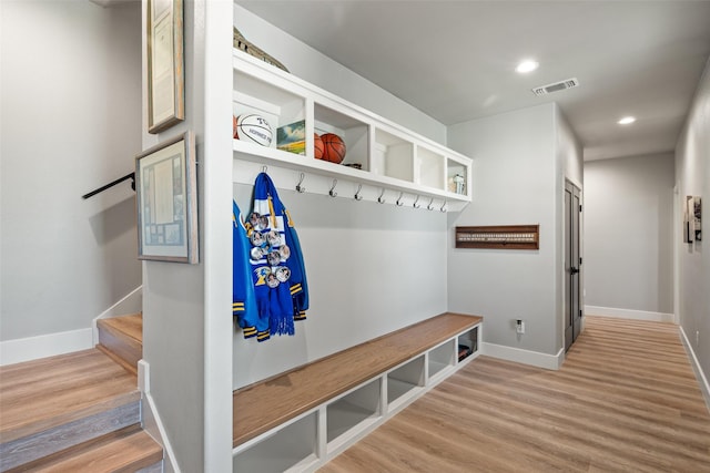 100 Tall Grass Ct, Weatherford, TX 76087 - mudroom with wood finished floors, baseboards, and recessed lighting