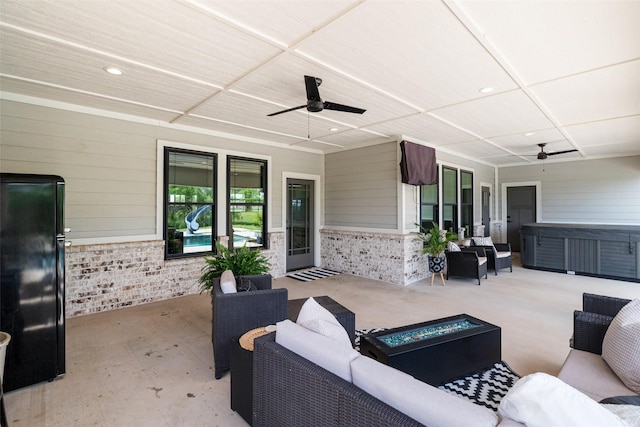 100 Tall Grass Ct, Weatherford, TX 76087 - view of patio featuring a ceiling fan, an outdoor living space with a fire pit, and a hot tub