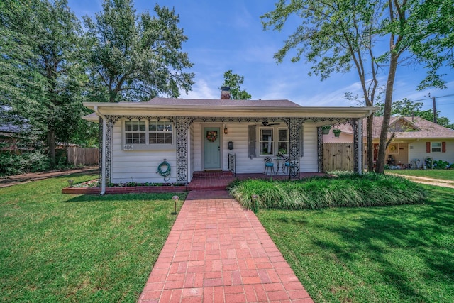 405 Houston St, Sulphur Springs, TX 75482 - bungalow with a porch, a chimney, and a ceiling fan