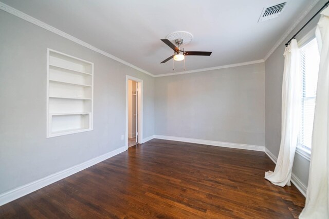 405 Houston St, Sulphur Springs, TX 75482 - spare room featuring plenty of natural light, baseboards, built in shelves, and ornamental molding