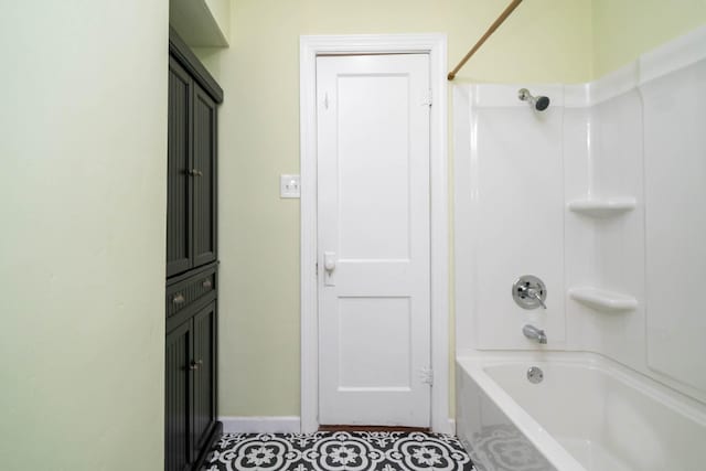 405 Houston St, Sulphur Springs, TX 75482 - bathroom with shower / bathtub combination and baseboards