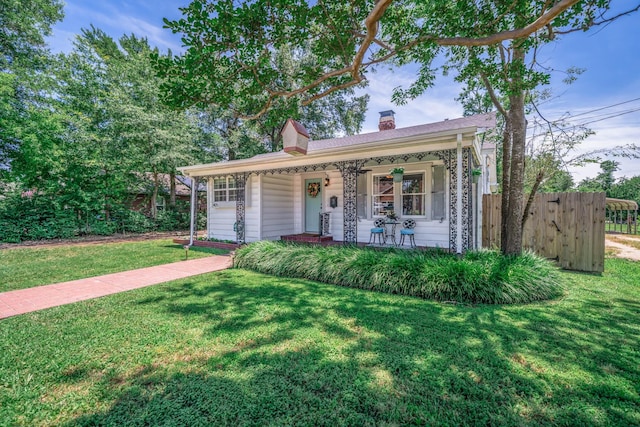 405 Houston St, Sulphur Springs, TX 75482 - view of front facade featuring covered porch and a chimney