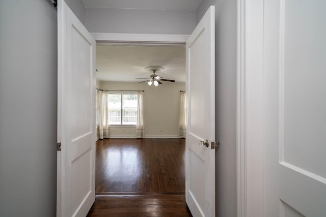 405 Houston St, Sulphur Springs, TX 75482 - hall featuring dark wood finished floors and baseboards