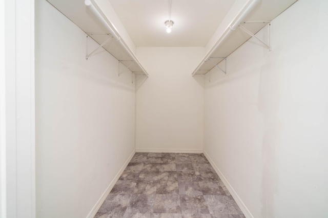 405 Houston St, Sulphur Springs, TX 75482 - walk in closet with stone finish flooring