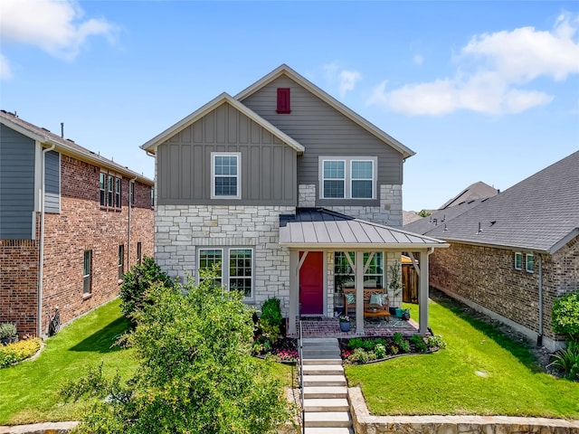 4860 Connor Pl, Fairview, TX 75069 - traditional-style house with board and batten siding, a front yard, a porch, and stone siding