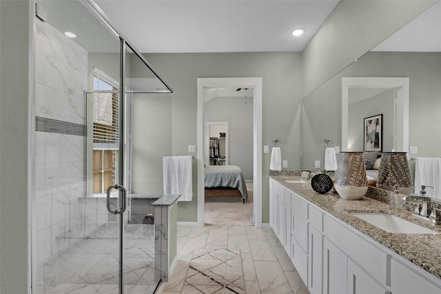 4860 Connor Pl, Fairview, TX 75069 - bathroom with ensuite bathroom, double vanity, marble look tiles, a shower stall, and baseboards