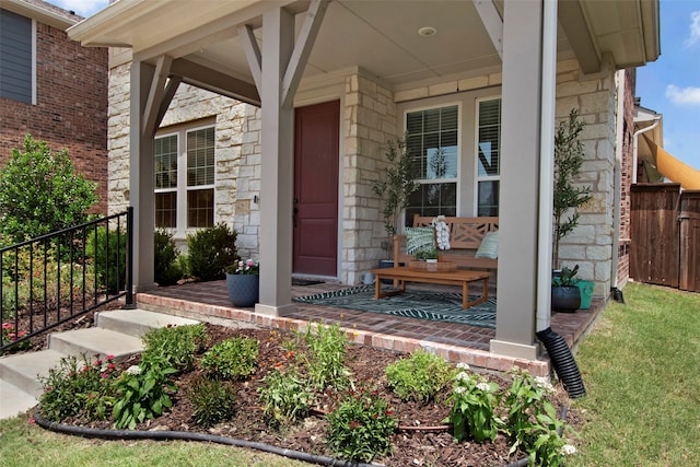 4860 Connor Pl, Fairview, TX 75069 - view of exterior entry with a porch and stone siding