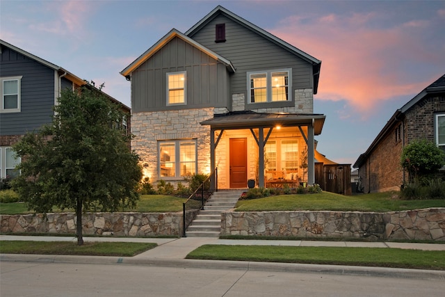 4860 Connor Pl, Fairview, TX 75069 - traditional-style home featuring board and batten siding, stone siding, and a yard